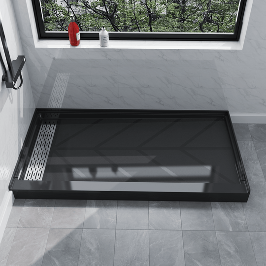 Side view of 60" x 32" SMC Shower Base with left Stainless Steel Linear Drain Cover, Black Shower Pan Base in modern bathroom