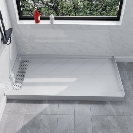 Side view of 60" x 32" SMC Shower Base with left Stainless Steel Linear Drain Cover, Glossy White Shower Pan Base in modern bathroom