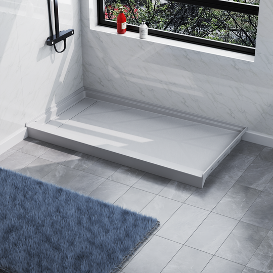 Angled view of 60'' x 32'' white SMC shower base with left linear drain and gloss finish, installed in modern bathroom#left_white