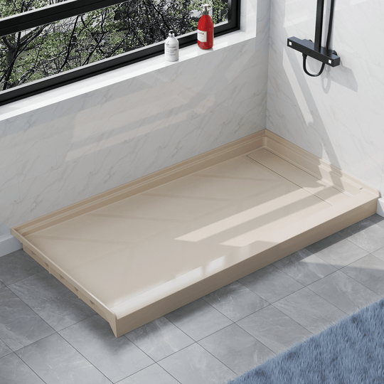 Angled view of 60'' x 32'' Beige SMC shower base with right linear drain and gloss finish, installed in modern bathroom with marble walls#color_beige#drain_right