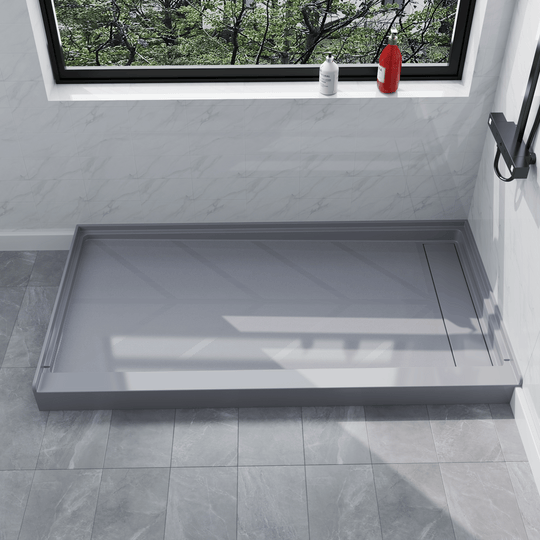 Side view of 60'' x 32'' Gray SMC shower base with right linear drain and gloss finish, installed in modern bathroom with marble walls#color_gray#drain_right