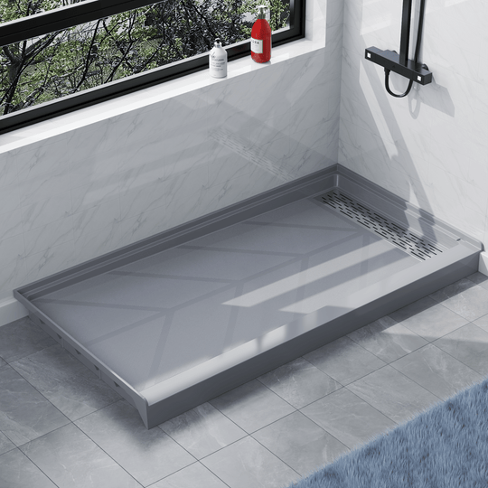 Angled view of 60" x 32" SMC Shower Base with right Stainless Steel Linear Drain Cover, Gray Shower Pan Base in modern bathroom